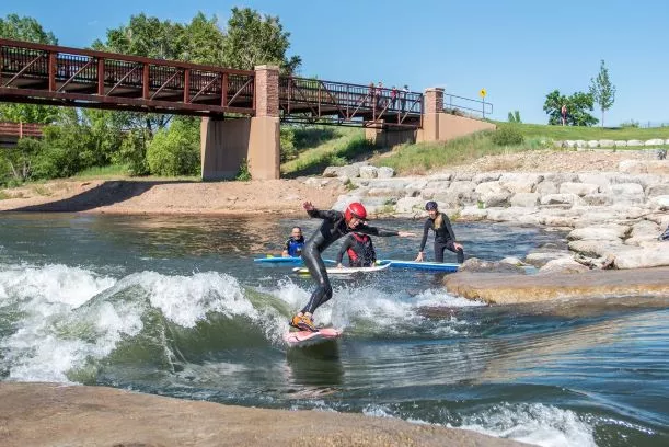 Surfing a recreation structure on a river in Colorado